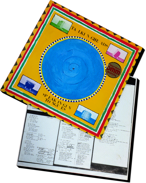 Image: Album cover and insert in question. The cover art consists of a yellow square with colorful decoration as a frame, and a blue vinyl disk as a centerpiece. The inlet is a scan of various handwritten notes, which are the lyrics of the songs.